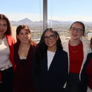 RAD team members with Phoenix and the desert mountains behind them