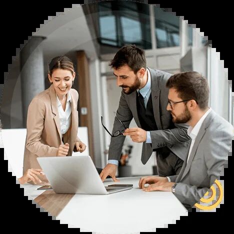 Genesis Acquisitions associates working together on a client campaign