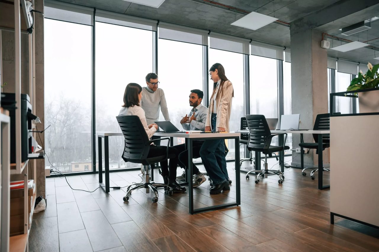 Hisel Marketing Inc. team members collaborating in the office