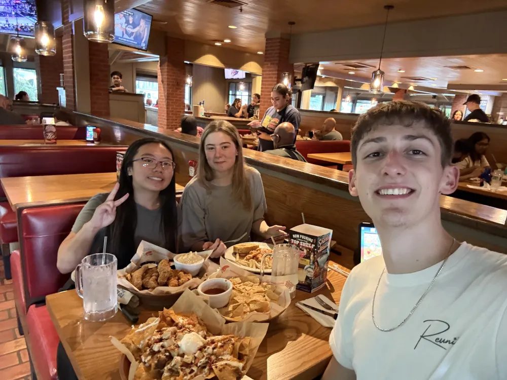 The team sharing a meal after a campaign day