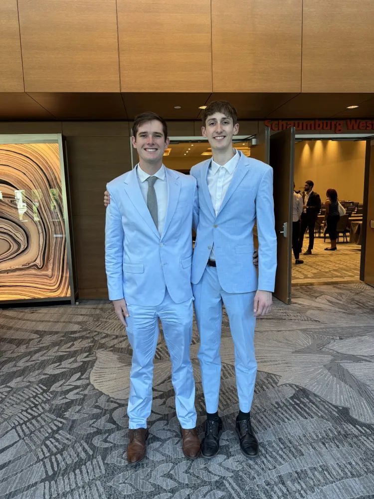 Two team members at a Hisel Marketing Inc. awards evening