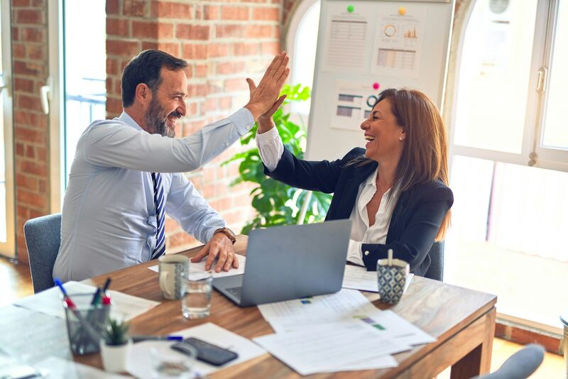 Sales representative shaking hands with a customer
