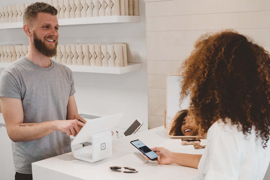 Retail customer service representative assisting a customer in store