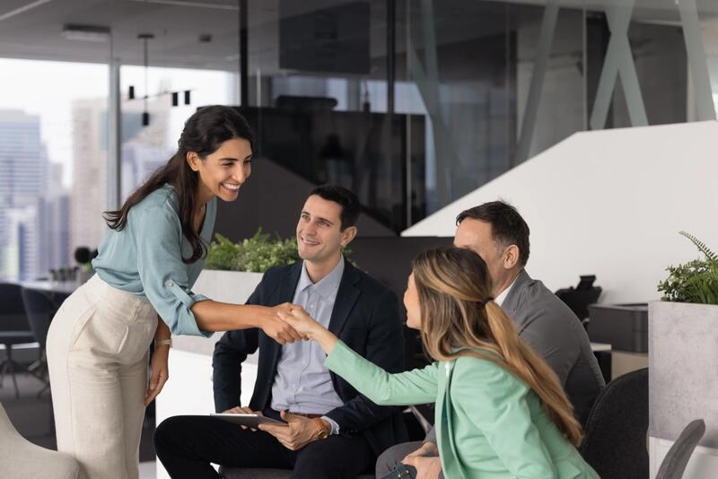 JDM Elite team members working together