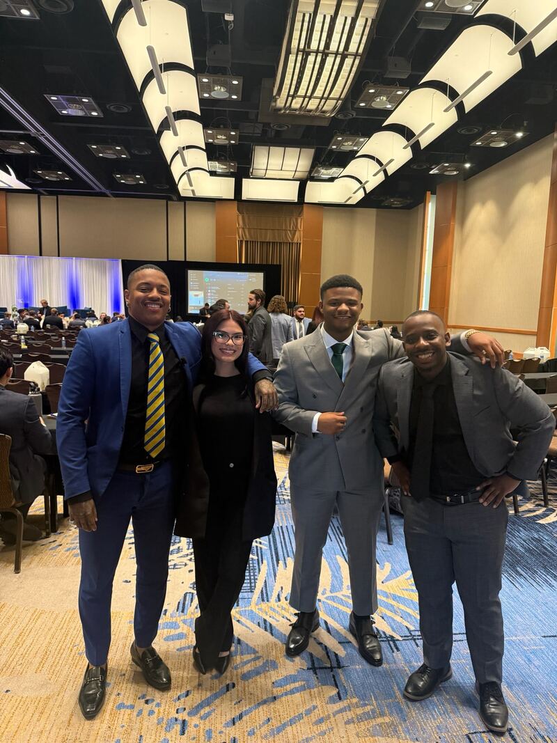 Four Kalispell Concepts team members at a conference