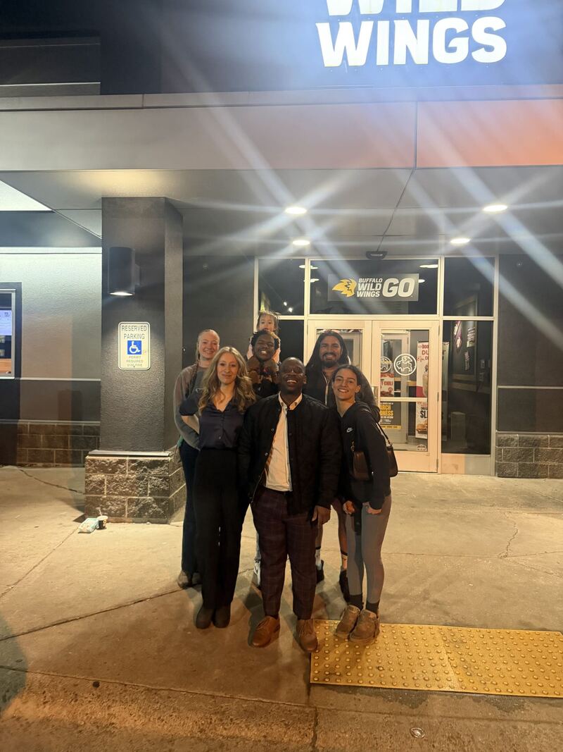 Kalispell Concepts team outside a venue at night