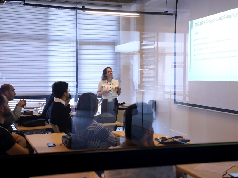 An audience seated at a business training presentation