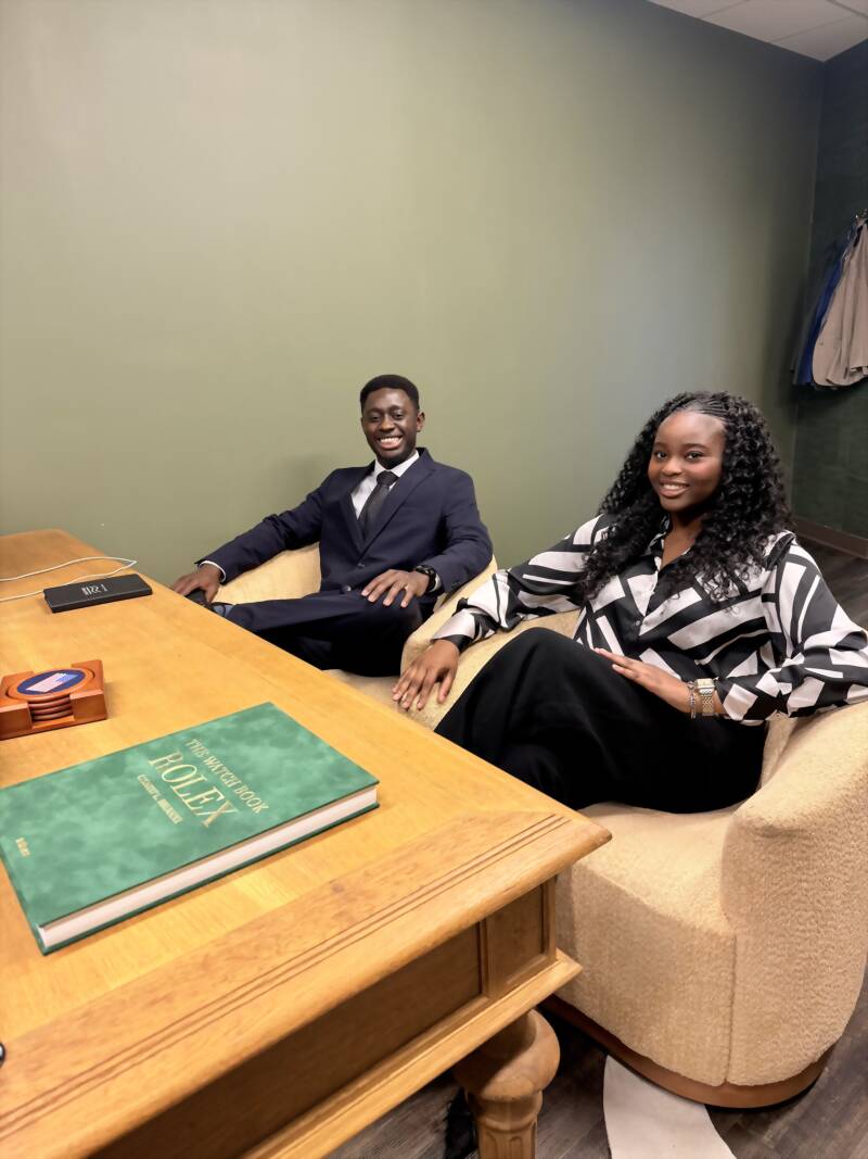 Two New Acquisitions team members in a one-to-one coaching session in the Atlanta office
