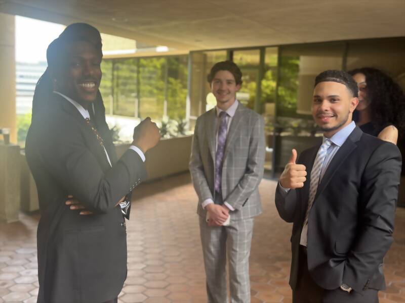 New Acquisitions team members outside their Atlanta office building