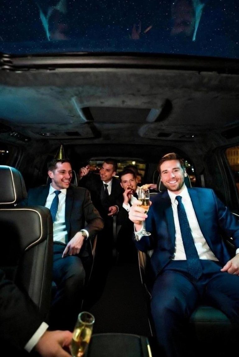 Bachelor party group boarding a luxury vehicle in Las Vegas