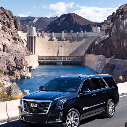 Black Cadillac Escalade parked on the road overlooking the Hoover Dam