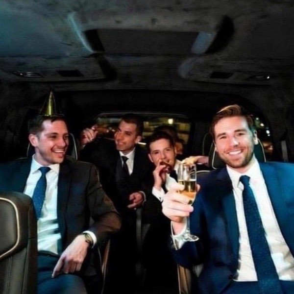 Bachelor party group boarding a luxury vehicle in Las Vegas
