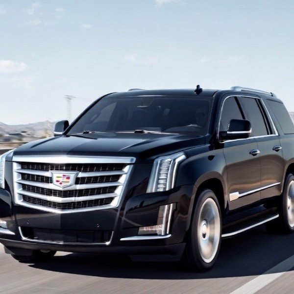 Cadillac Escalade on a city-to-city interstate transfer