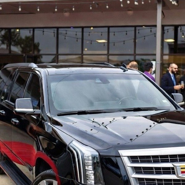 Cadillac Escalade arriving at a private party and social event