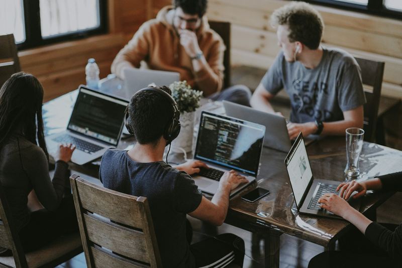 Two recruiters reviewing candidate pipelines together