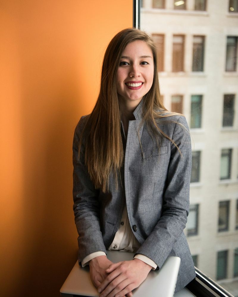 Sales executive candidate seated in a modern office