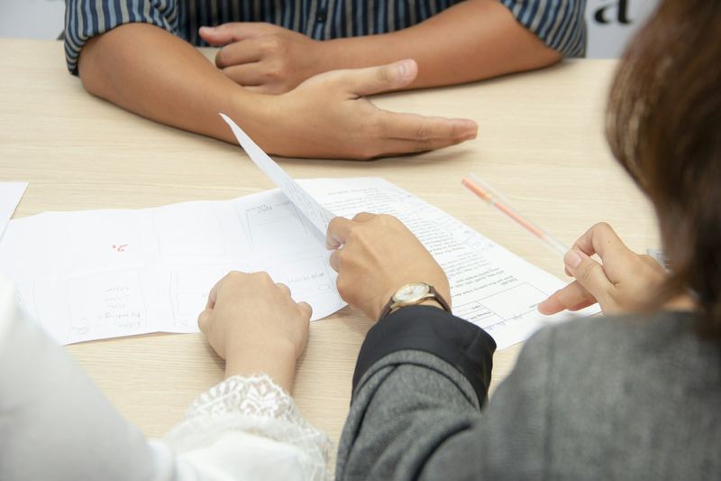 Search consultant reviewing a candidate profile with a client