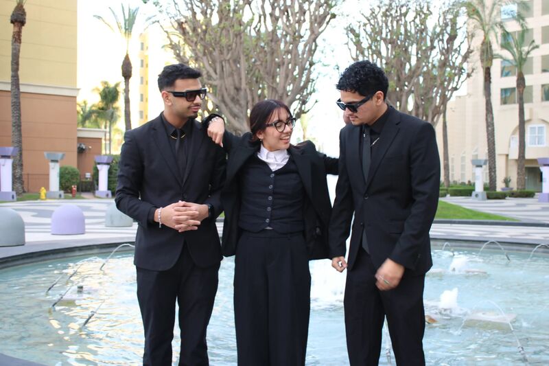 Sora Acquisitions team members posing together outdoors