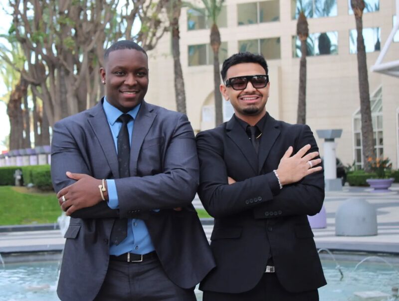 Sora Acquisitions representatives in suits outdoors