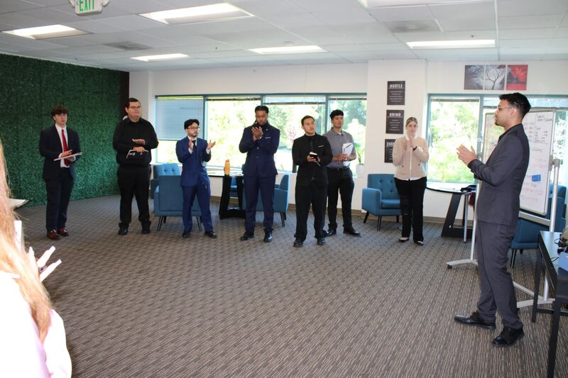 Sora Acquisitions representatives during a team presentation