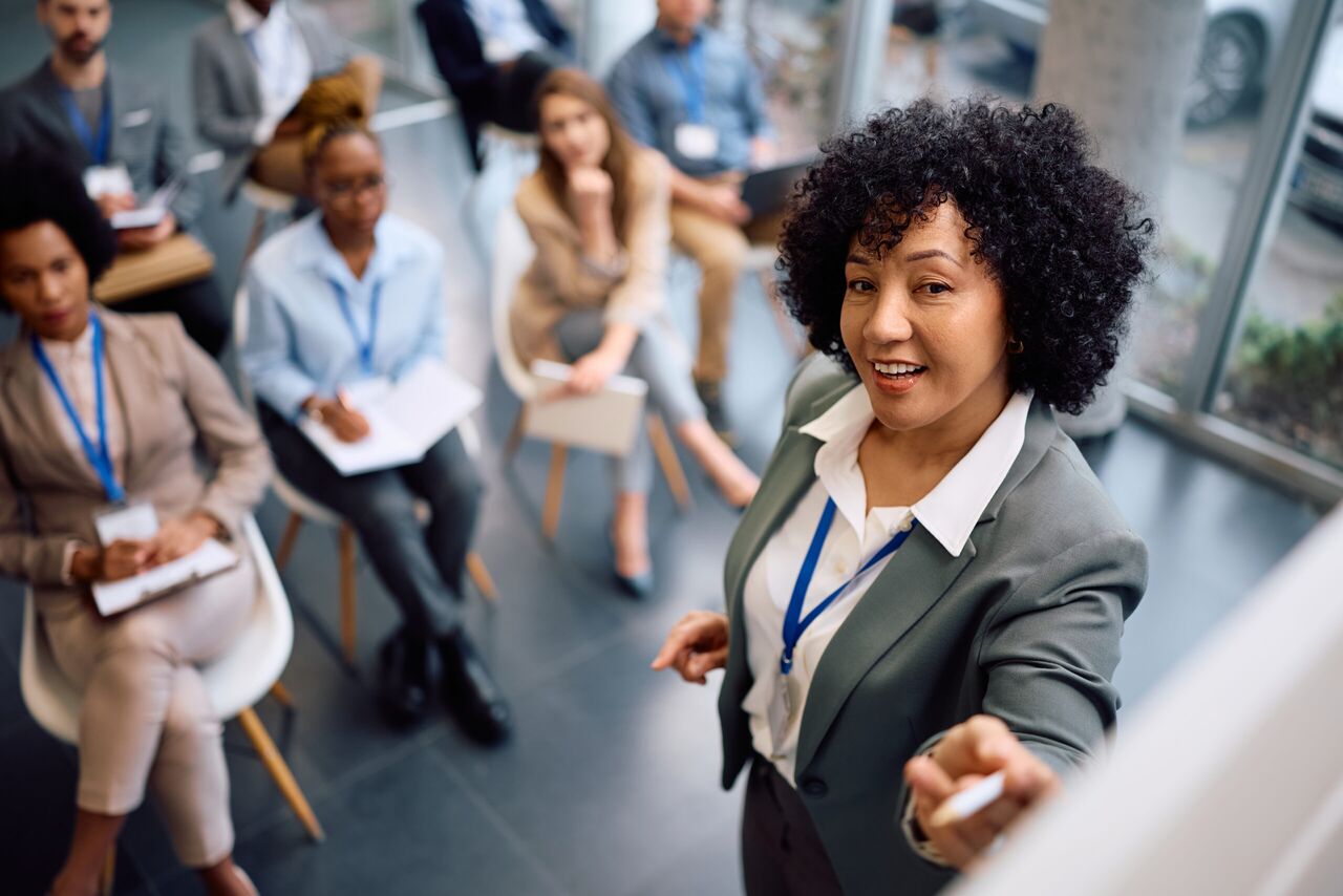 An instructor teaching leadership techniques to students