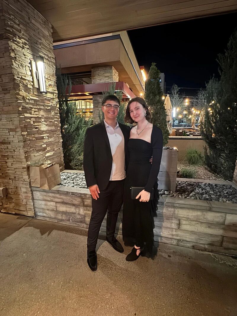 Two Super Nova Marketing team members dressed up for an evening company event