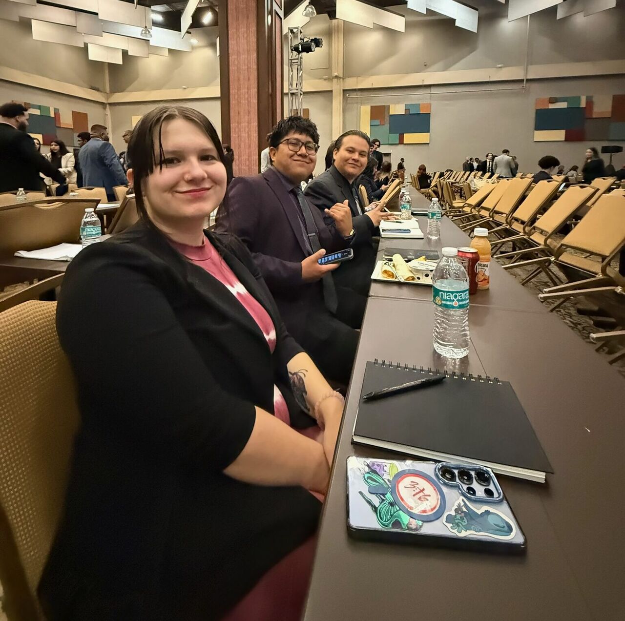 Super Nova Marketing team members networking during a company gathering