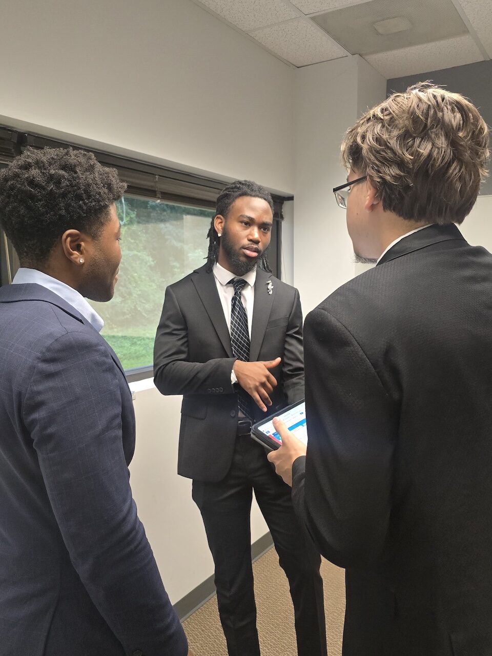 Marketing professionals collaborating in a modern workspace